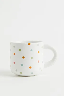 Tasse à pois en porcelaine