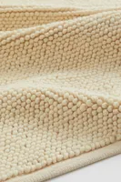 Tapis texturé en laine mélangée