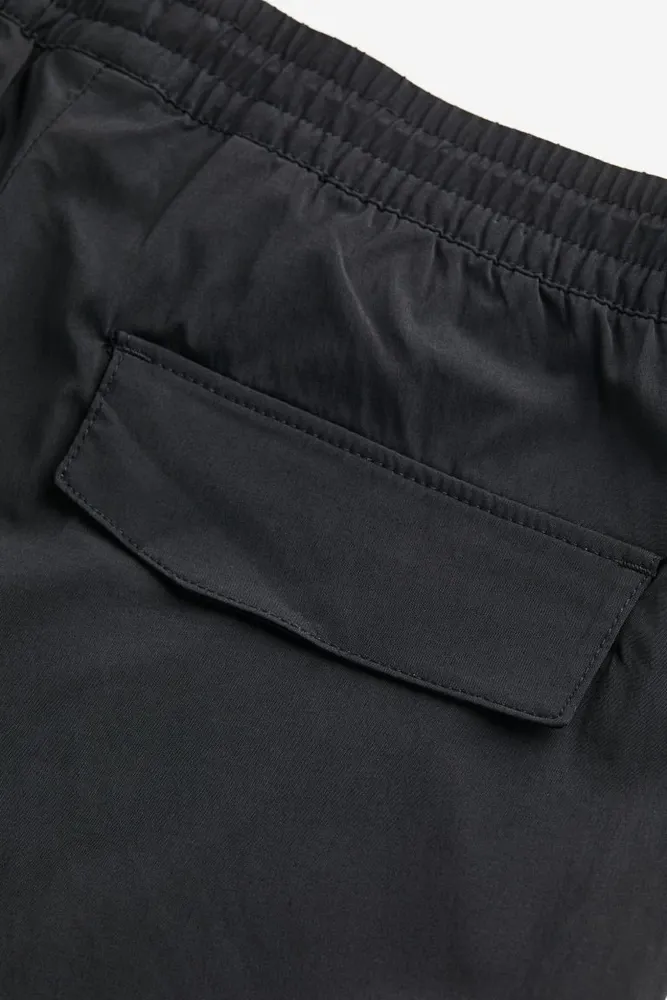 Nylon Cargo Trousers in Black - Men