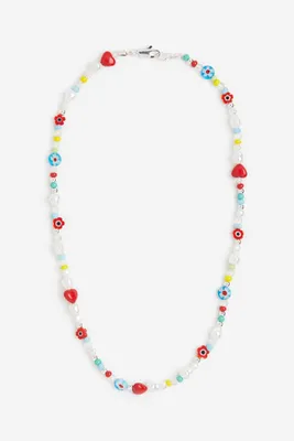 Collier avec perles fantaisie