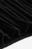 Rib-knit Sweater with Asymmetric Hem