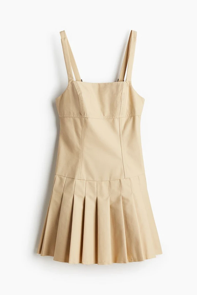 Low-back Dress with Pleated Skirt