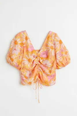 Blouse avec lien de serrage