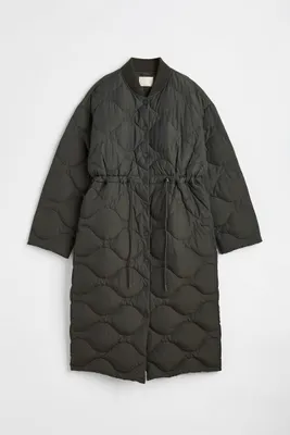 Manteau matelassé avec taille resserrable