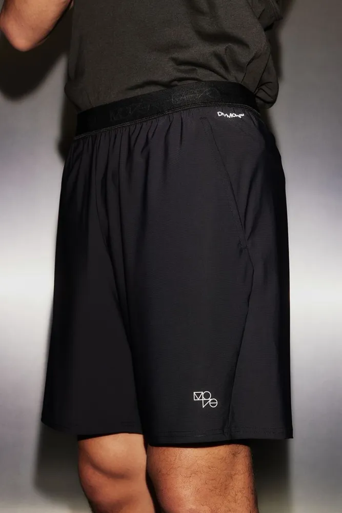 DryMove™ Sports trousers in 4-way stretch - Black - Men