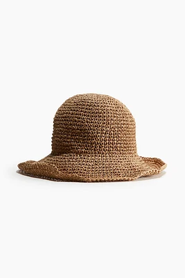 Sombrero de paja con ala ondulada