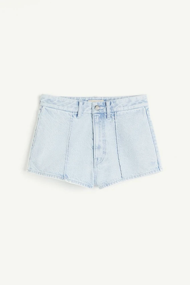 Shorts mini en denim con pliegues