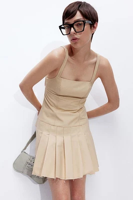 Low-back Dress with Pleated Skirt