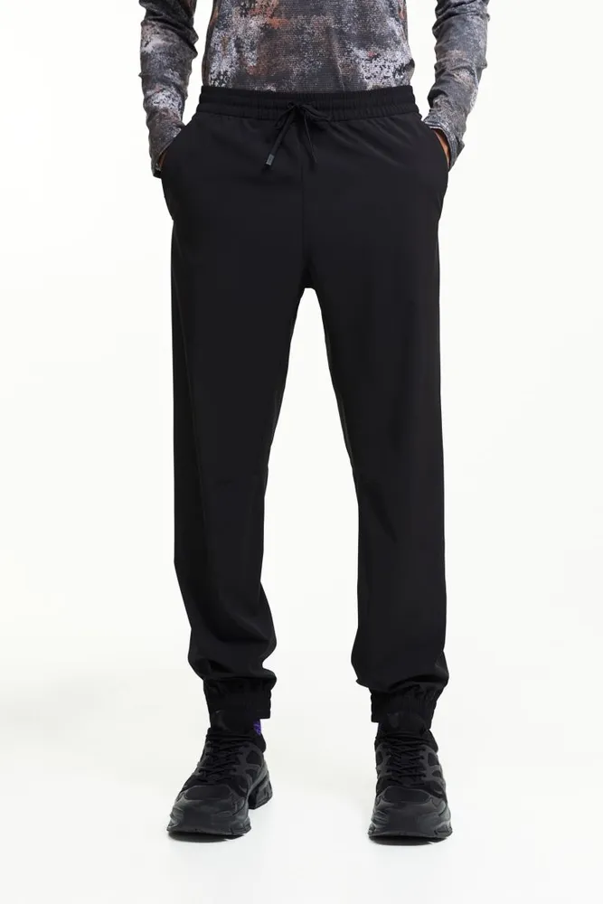 DryMove™ Sports trousers in 4-way stretch - Black - Men