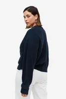 Pull en maille côtelée