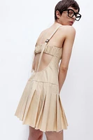 Low-back Dress with Pleated Skirt