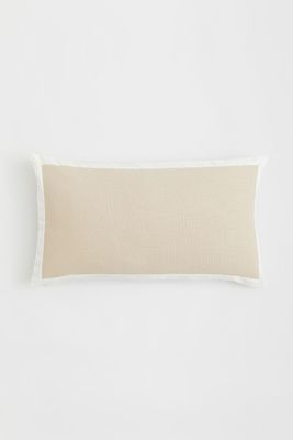 Housse de coussin avec biais
