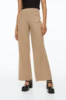 Pantalon à boutons