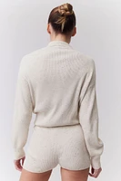 Suéter en tejido acanalado con cuello