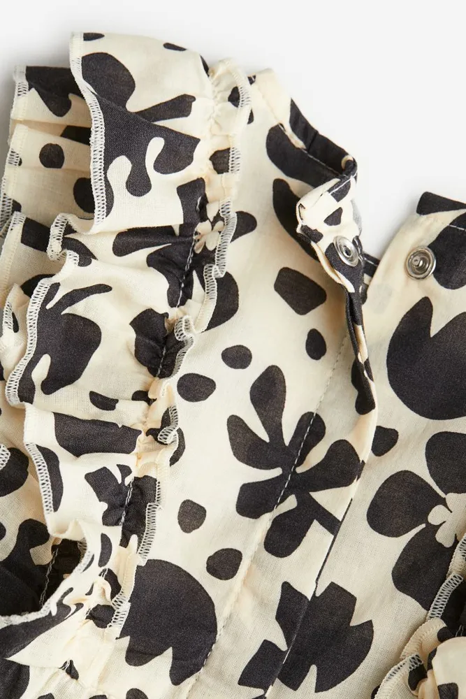 Ruffle-trimmed Romper Suit