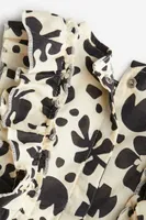 Ruffle-trimmed Romper Suit