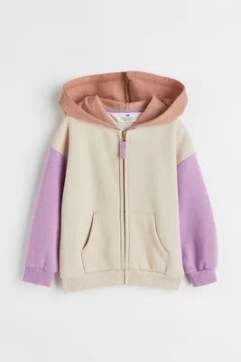 Veste à capuche zippée