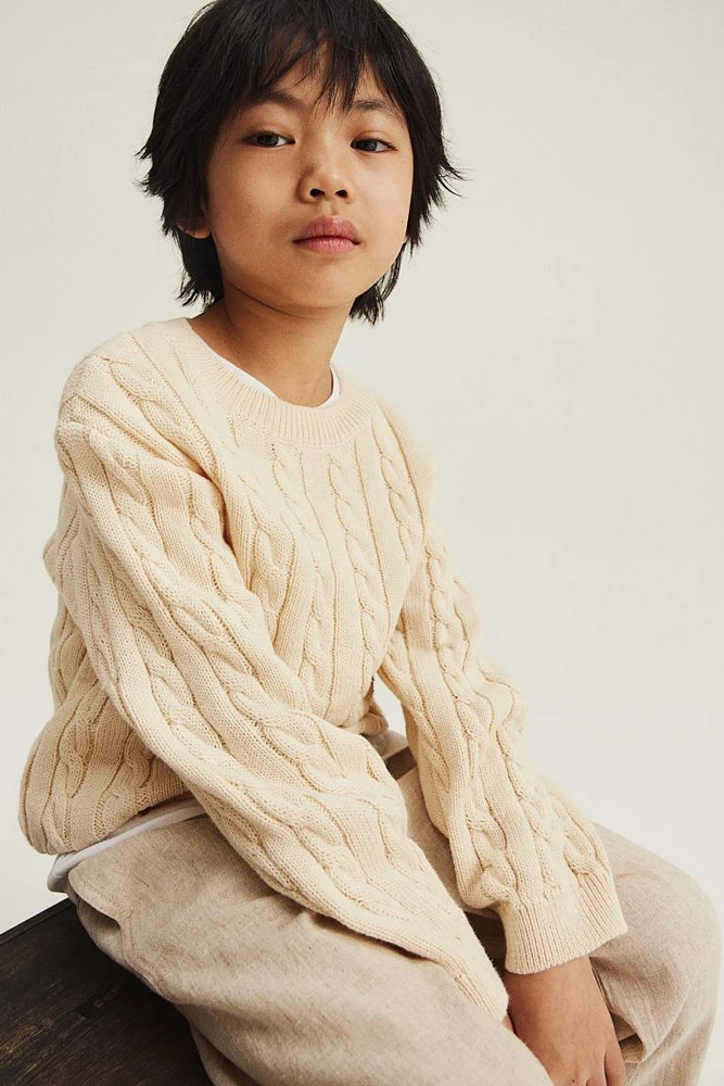 Suéter en tejido trenzado de algodón
