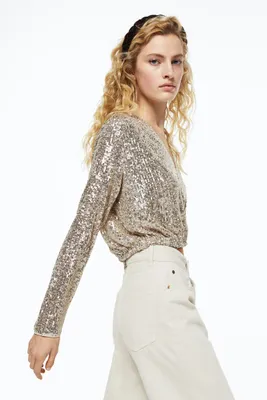 Blouse croisée à paillettes