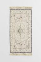 Patterned Rug with Tassels