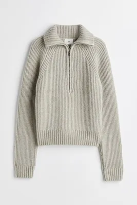 Suéter acanalado con zíper