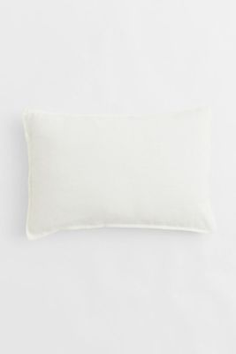 Housse de coussin en lin lavé