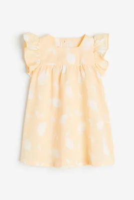 Flutter-sleeved Dress