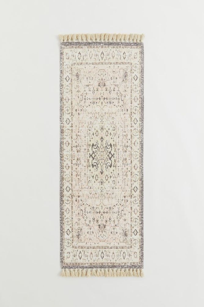 Patterned Rug with Tassels