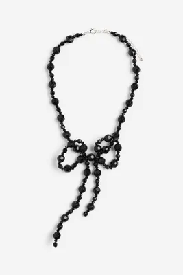 Collier de perles fantaisie avec nœud
