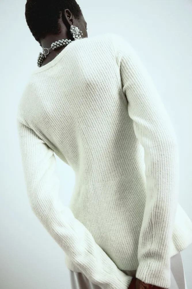 Rib-knit Peplum Sweater