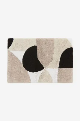 Tapis de bain à motif