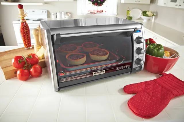 https://cdn.mall.adeptmind.ai/https%3A%2F%2Fmedia-www.canadiantire.ca%2Fproduct%2Fliving%2Fkitchen%2Fkitchen-appliances%2F0430832%2Fblack-decker-6-slice-convection-toaster-oven-0db106a8-69dc-4d68-b12a-bd24aa772c18.png_640x.webp