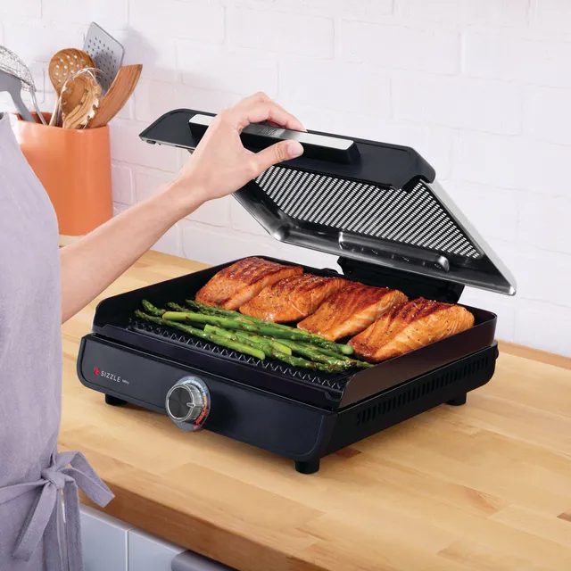 https://cdn.mall.adeptmind.ai/https%3A%2F%2Fmedia-www.canadiantire.ca%2Fproduct%2Fliving%2Fkitchen%2Fkitchen-appliances%2F4991081%2Fninja-sizzle-smokeless-indoor-grill-a7609718-ff13-4e88-ab9a-3ff1d5ccd01c-jpgrendition.jpg_640x.webp