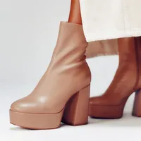 Jaqulin Mid-calf platform heeled boots