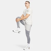 Men's Nike Unlimited Water-Repellent Tapered Versatile Pants
