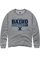 Brittany Baird  Rally Xavier Musketeers Mens Graphite NIL Stacked Box Long Sleeve Crew Sweatshir..