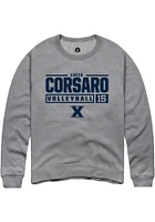 Lucia Corsaro  Rally Xavier Musketeers Mens Graphite NIL Stacked Box Long Sleeve Crew Sweatshirt