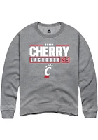 Devon Cherry  Rally Cincinnati Bearcats Mens Graphite NIL Stacked Box Long Sleeve Crew Sweatshir..