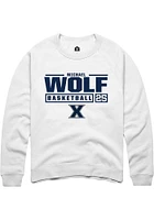 Michael Wolf  Rally Xavier Musketeers Mens White NIL Stacked Box Long Sleeve Crew Sweatshirt