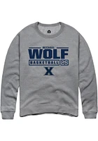 Michael Wolf  Rally Xavier Musketeers Mens Graphite NIL Stacked Box Long Sleeve Crew Sweatshirt