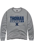 Taylor Thomas  Rally Xavier Musketeers Mens Graphite NIL Stacked Box Long Sleeve Crew Sweatshirt