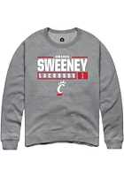 Amanda Sweeney  Rally Cincinnati Bearcats Mens Graphite NIL Stacked Box Long Sleeve Crew Sweatshir..