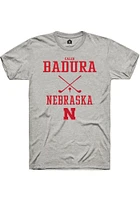 Caleb Badura  Nebraska Cornhuskers Ash Rally NIL Sport Icon Short Sleeve T Shirt