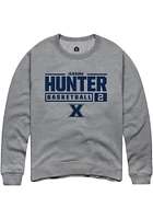 Jerome Hunter  Rally Xavier Musketeers Mens Graphite NIL Stacked Box Long Sleeve Crew Sweatshirt