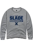 Claire Slade  Rally Xavier Musketeers Mens Graphite NIL Stacked Box Long Sleeve Crew Sweatshirt