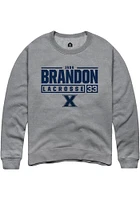 Jada Brandon  Rally Xavier Musketeers Mens Graphite NIL Stacked Box Long Sleeve Crew Sweatshirt