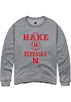 Callin Hake  Rally Nebraska Cornhuskers Mens Graphite NIL Sport Icon Long Sleeve Crew Sweatshirt