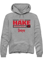 Callin Hake  Rally Nebraska Cornhuskers Mens Graphite NIL Stacked Box Long Sleeve Hoodie