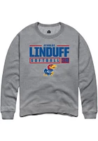 Aynslee Linduff  Rally Kansas Jayhawks Mens Graphite NIL Stacked Box Long Sleeve Crew Sweatshirt