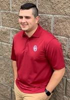 Antigua Oklahoma Sooners Mens Cardinal Tribute Short Sleeve Polo